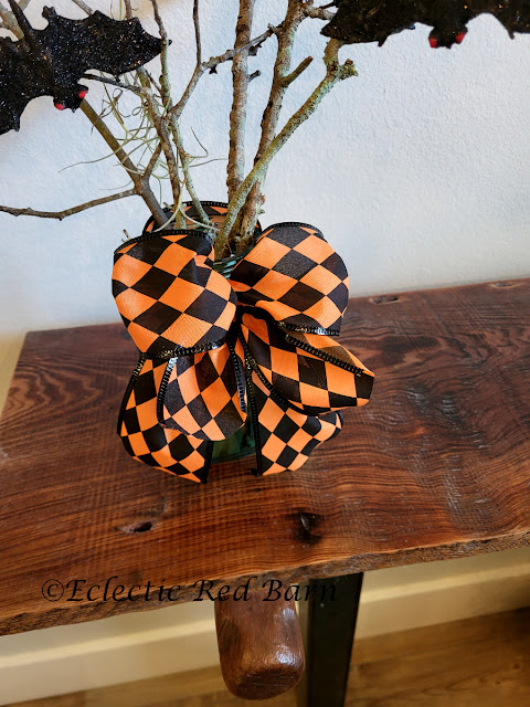 Bat, Branches, and Bows. Share NOW.#Halloween, #halloweendecor, #halloweendecorations, #DollarTreeCraft, #eclecticredbarn